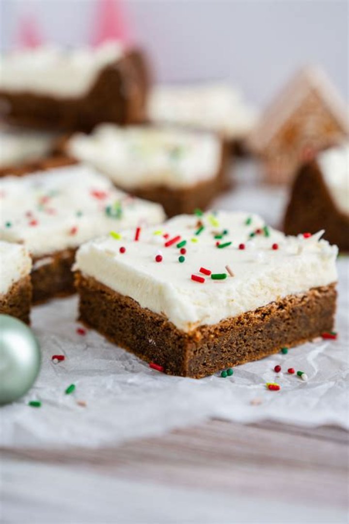 Gingerbread cookie bars with white chocolate chips.